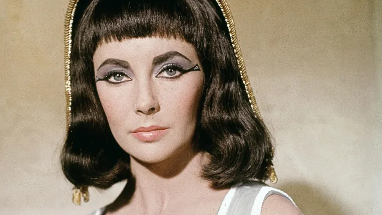 British actress Elizabeth Taylor on the set of Cleopatra, directed by American Joseph L. Mankiewicz.
